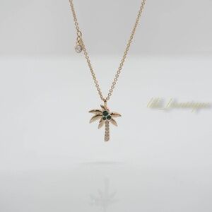 NIB Swarovski 5371158 Palm Pendant Necklace Clear Crystal Green Gold Plated $99